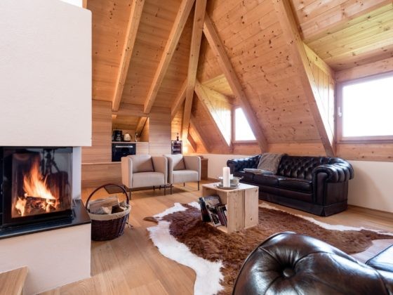 Charmingplace Mitterstiller Südtirol Wohnraum mit Kamin