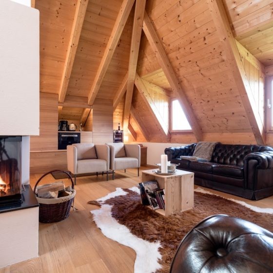Charmingplace Mitterstiller Südtirol Wohnraum mit Kamin